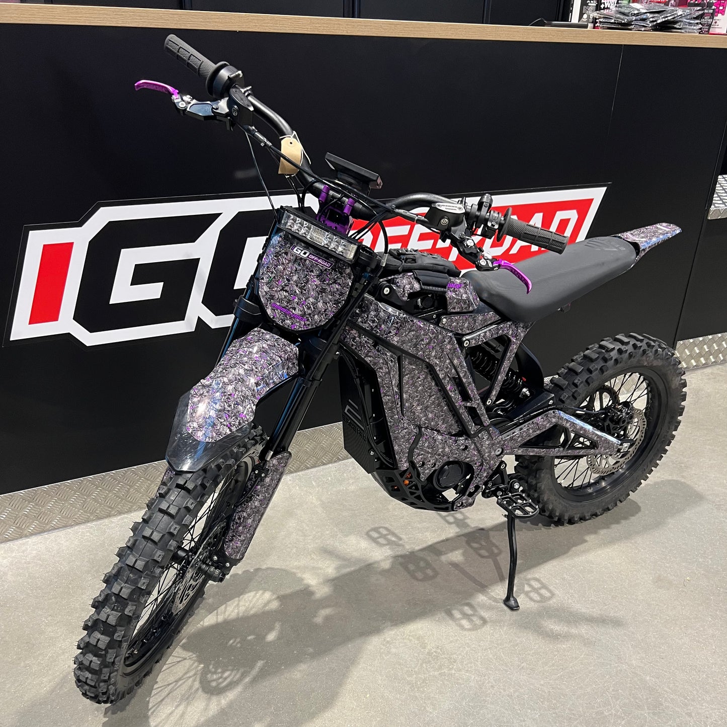 USED E-RIDE PRO SR WITH PURPLE UPGRADES