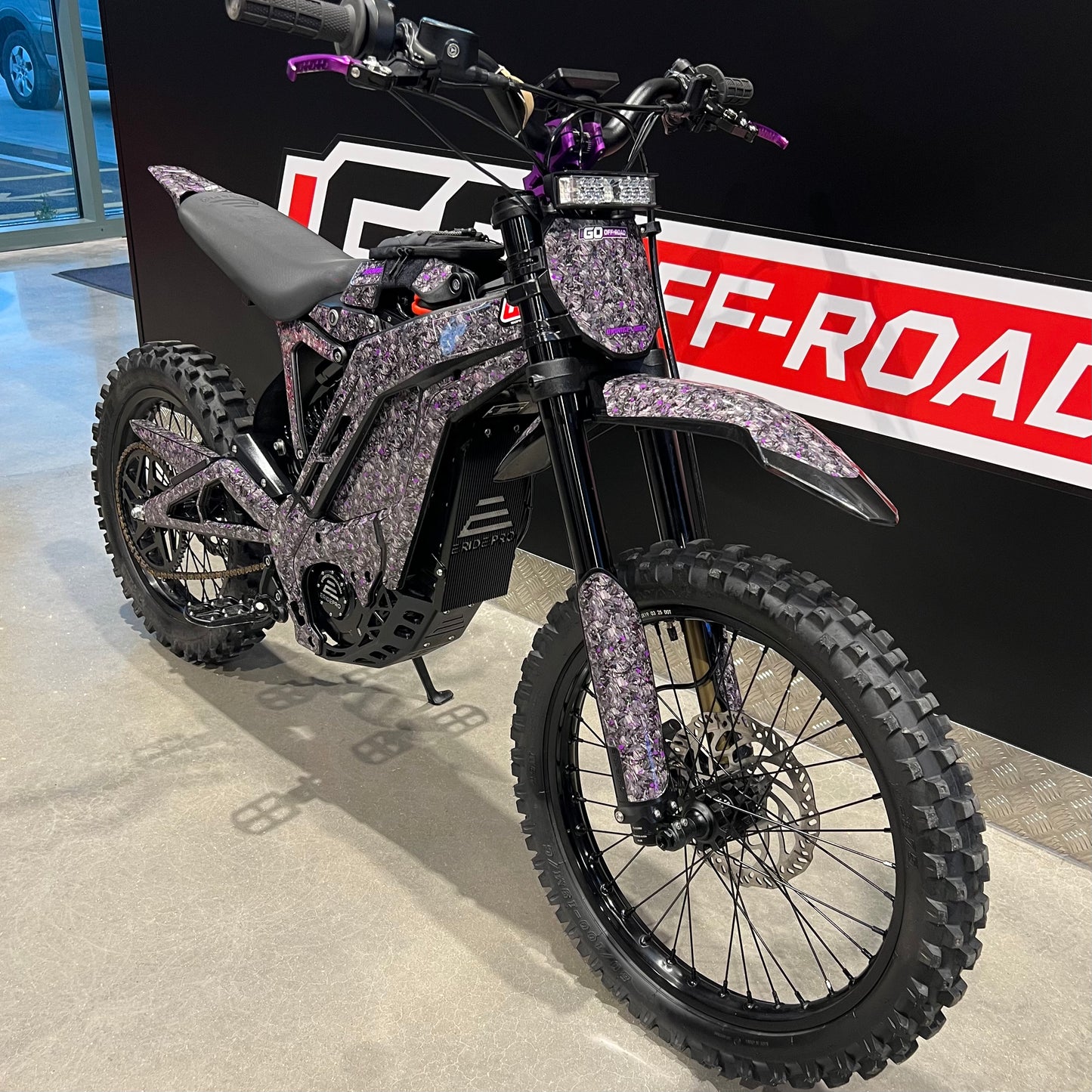 USED E-RIDE PRO SR WITH PURPLE UPGRADES