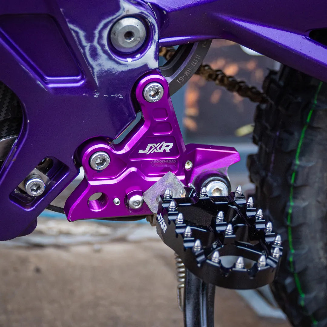 JXR Sur Ron Light Bee FootPeg Brackets (Left + Right) - Go Off Road Barnsley