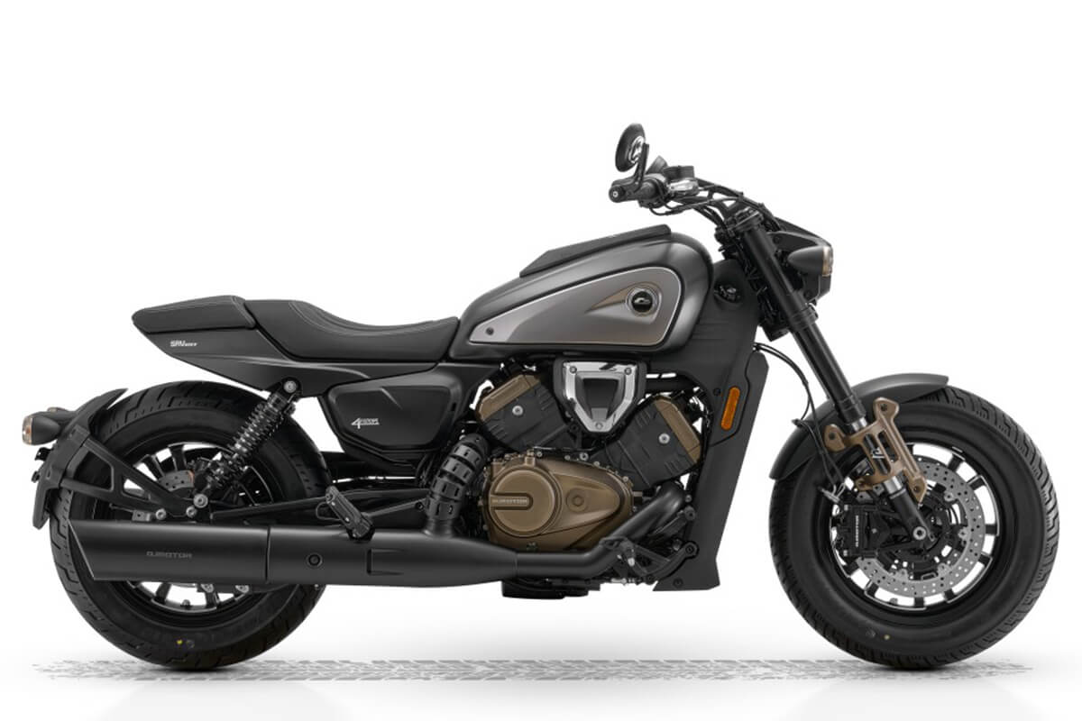 Side view of QJMotor SRV 600 V4 power cruiser in black showing quad exhaust pipes and low-slung stance